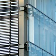 Abstract fragment of contemporary architecture, walls made of glass and concrete.